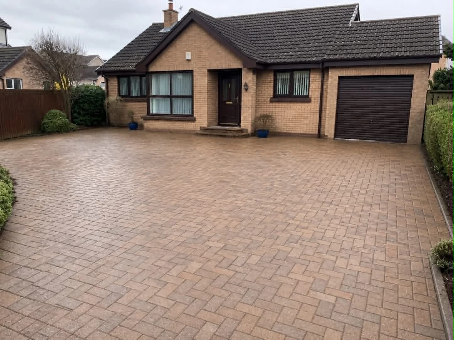 Block-paved driveway in Limavady before and after professional pressure washing (after)