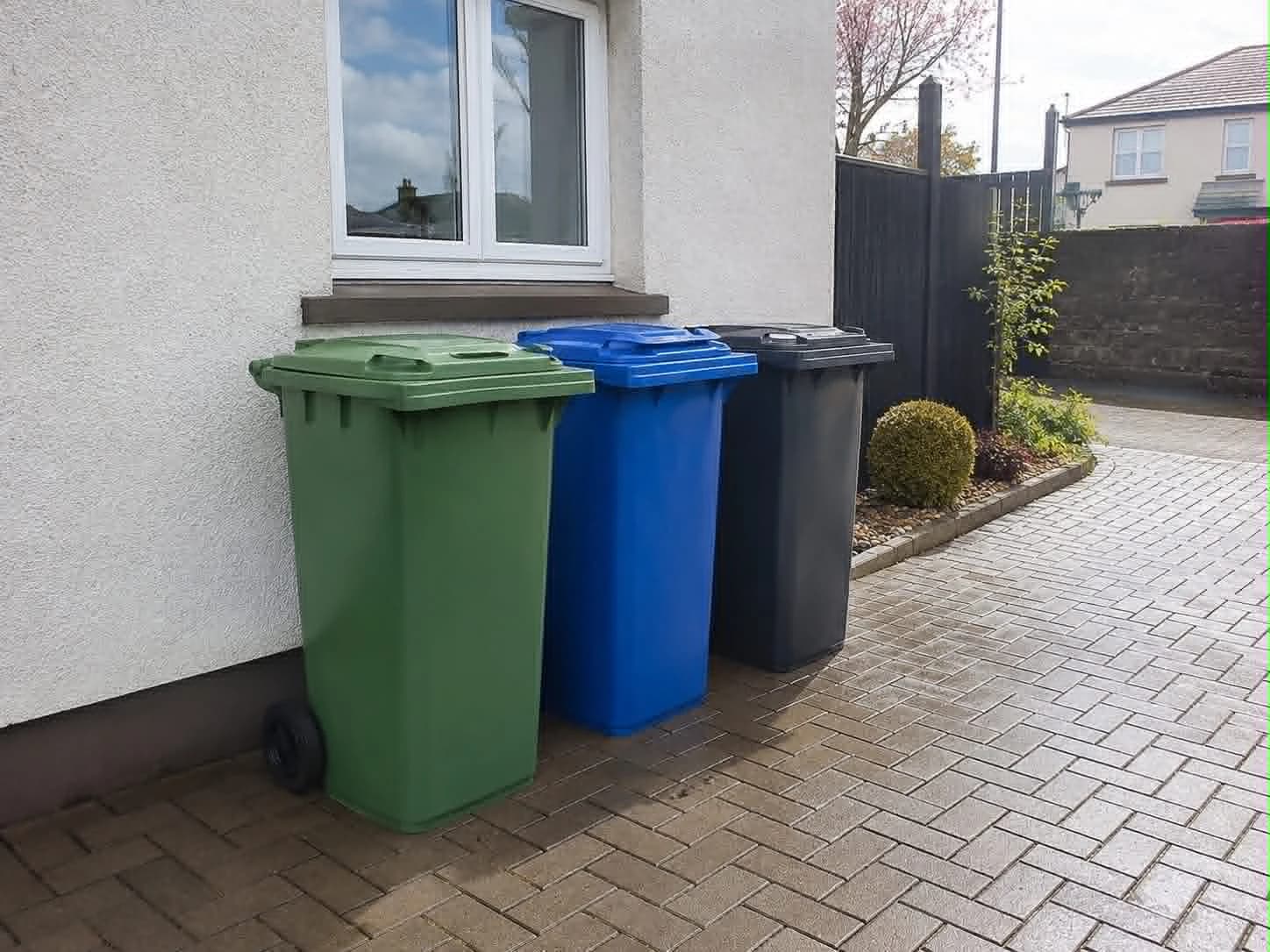Freshly cleaned domestic wheelie bins outside a home in Limavady